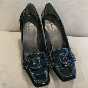 Black patent leather heeled loafers